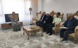 تکریم خانواده شهیدان ملا رحیم بهرامی و خضر میناشیری در بوکان